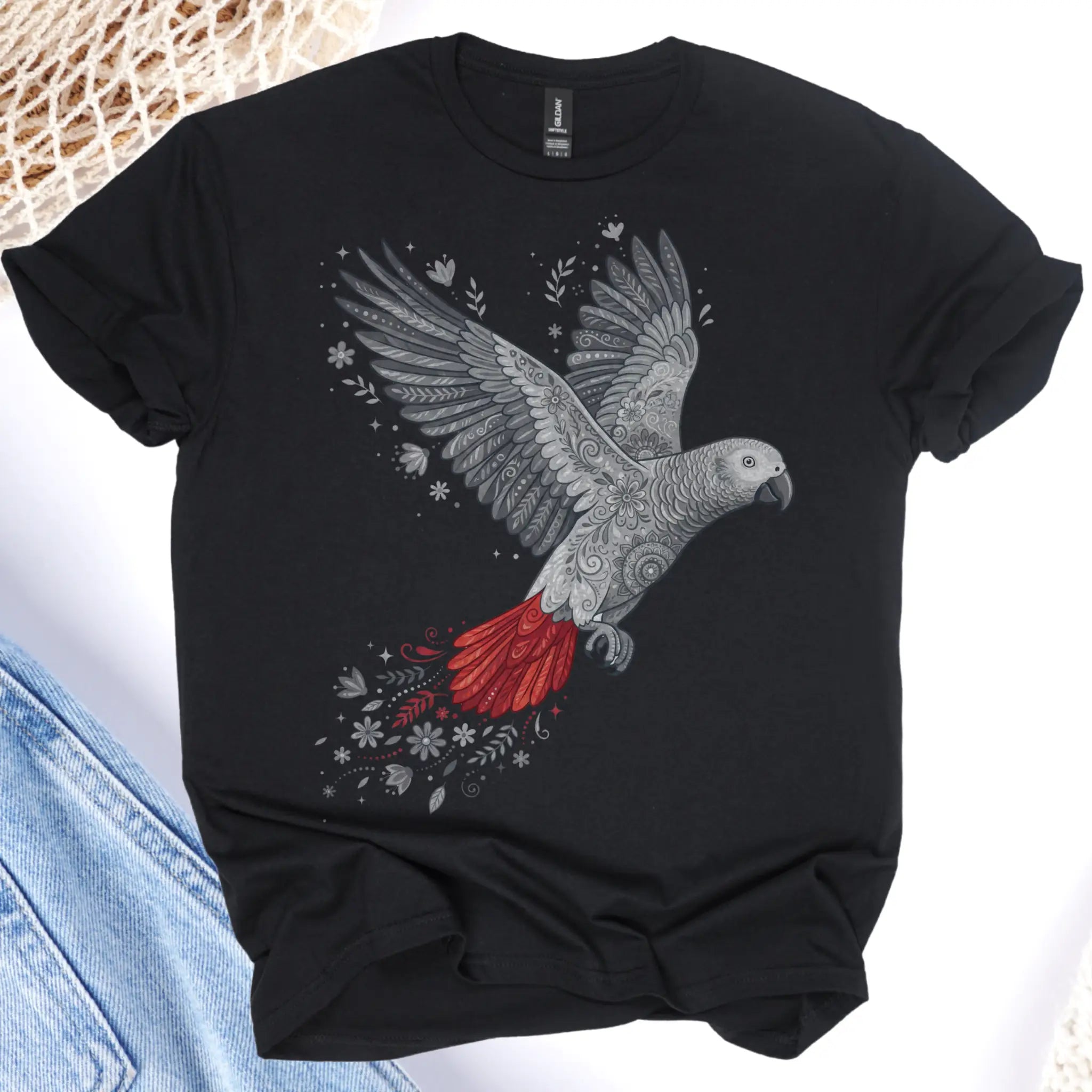 Black t-shirt with a parrot design on a white background