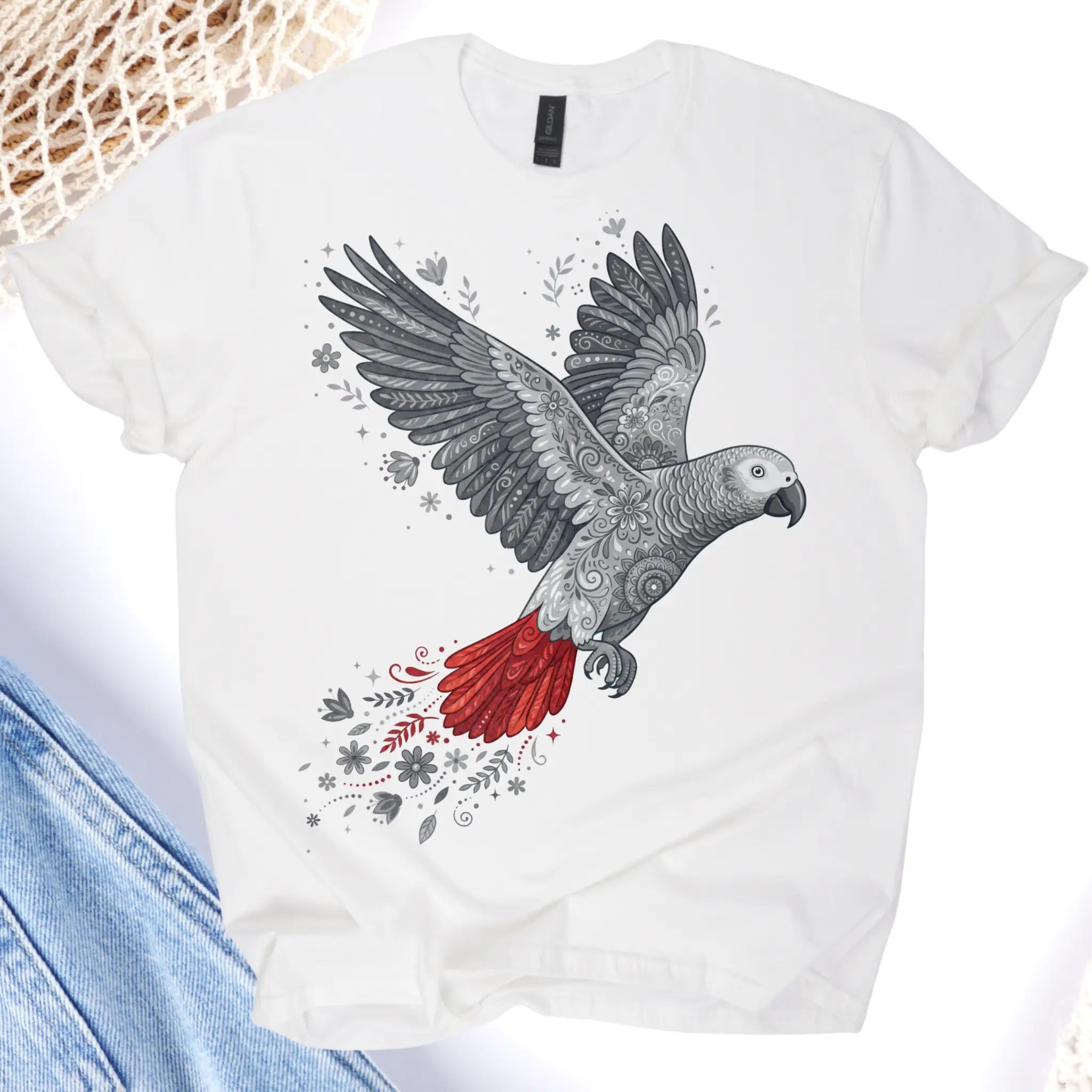White t-shirt with a parrot design on a white background
