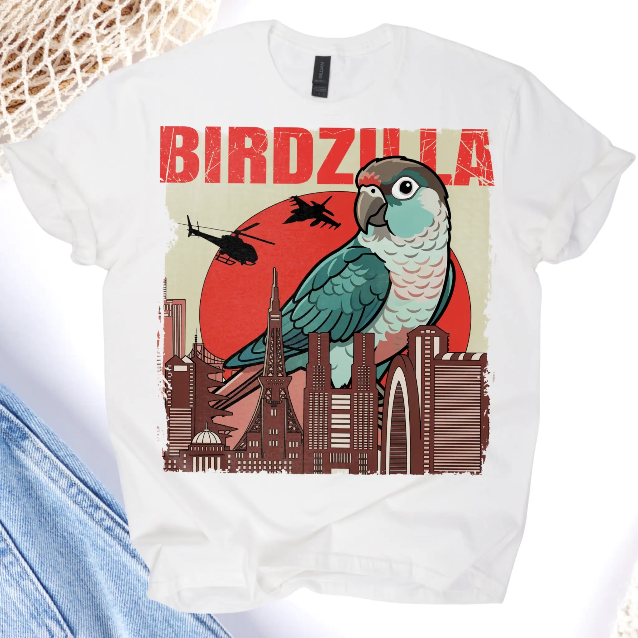 White t-shirt with a parrot graphic and 'BIRDZILLA' text on a white background